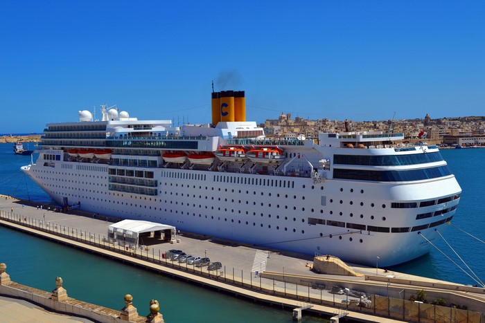 Costa neoRomantica cruise liner docked at a harbor