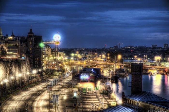 Stockholm at Night with Illuminated Robot Sign
