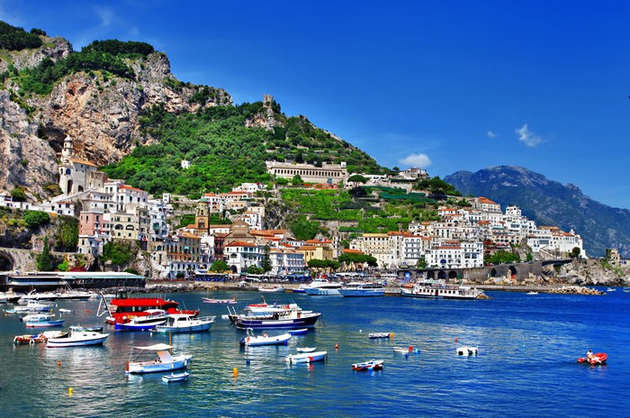 Amalfi Coast, Italy with boats in the harbor