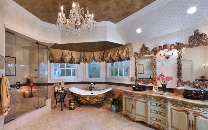 Luxury bathroom with ornate details and a chandelier