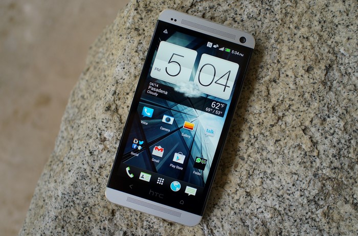 HTC One smartphone on a rock