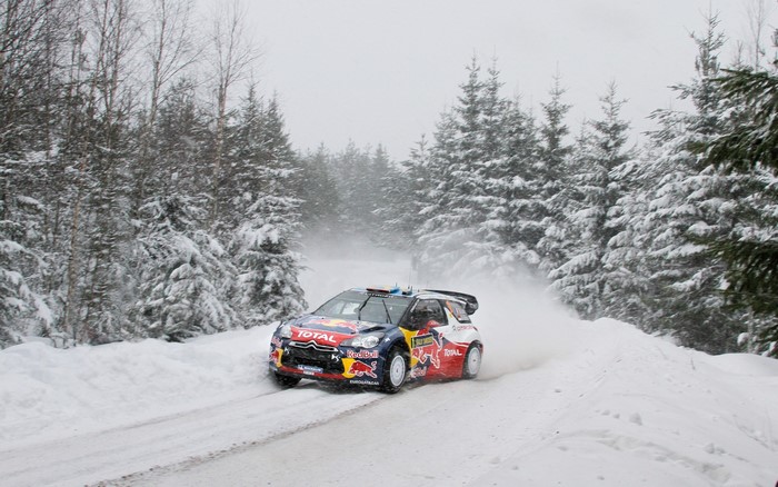 Citroen DS3 rally car driving on a snowy road