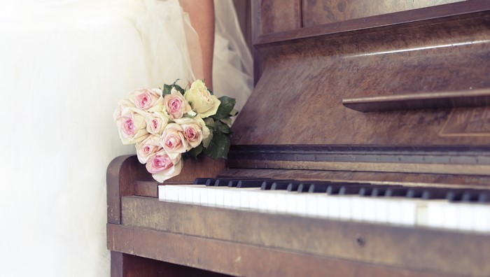Bouquet of Roses on a Piano