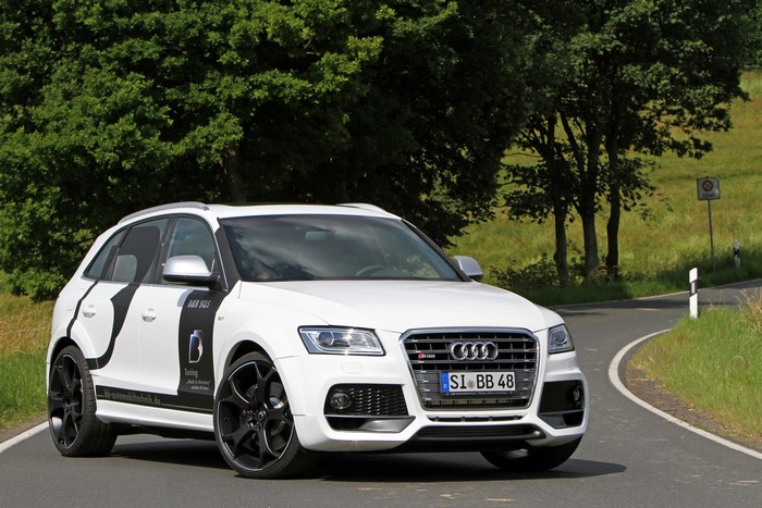White Audi SQ5 on a winding road