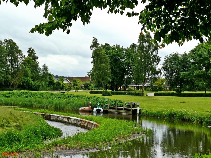 Park with pond and swan pedal boats in Syddanmark, Denmark