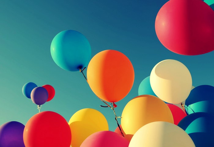Colorful balloons floating in the sky