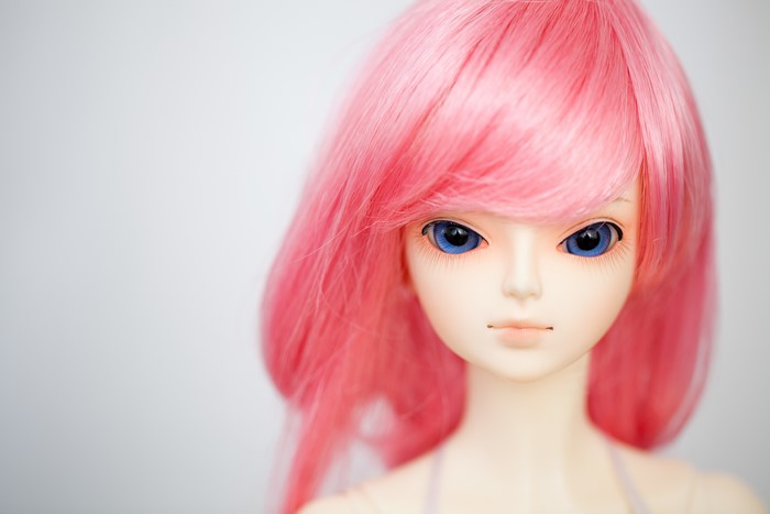 Doll with pink hair and blue eyes