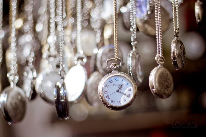 Collection of antique pocket watches on chains