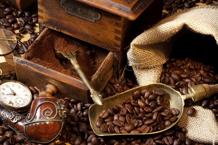 Coffee beans, grinder, and pipe