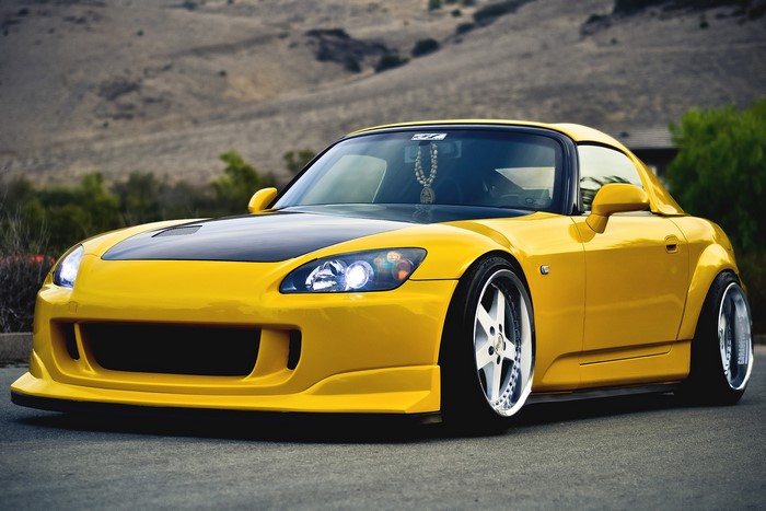 Yellow Honda S2000 with custom modifications