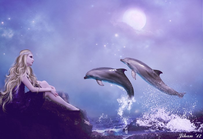 Blonde girl watching dolphins jump near the coast under the moon