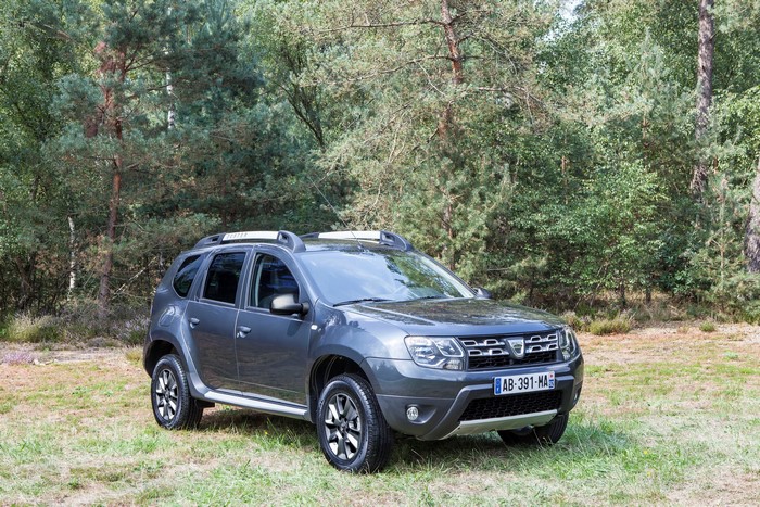 Dacia Duster parked in a forest clearing