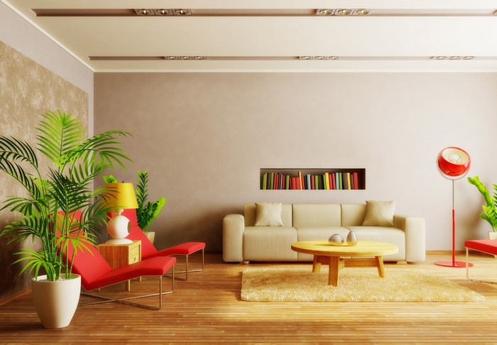 Modern living room with sofa and red chairs