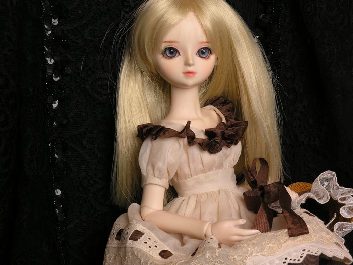 Blonde doll in a dress