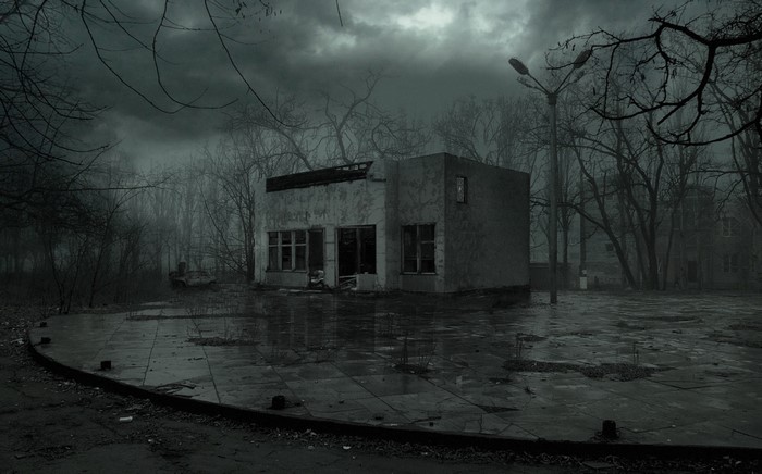 Abandoned building in a foggy, post-apocalyptic landscape