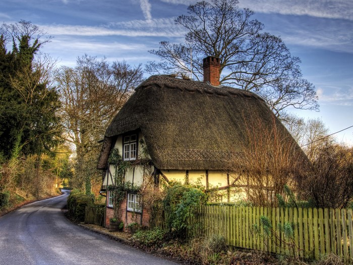 Thatched Cottage on a Winding Road in Hampshire, England