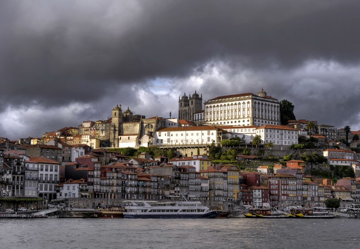 Porto, Portugal cityscape with dramatic clouds