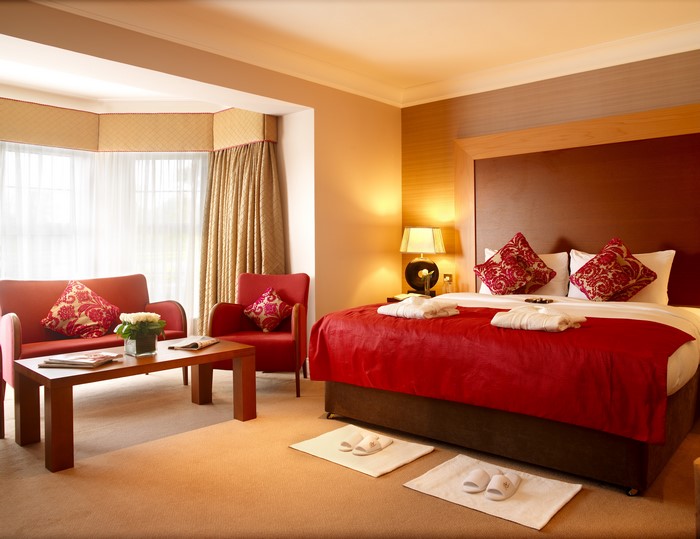 Hotel Bedroom Interior Design with Red Accents