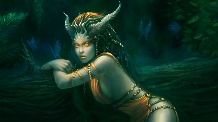 Demon woman with horns in a dark forest