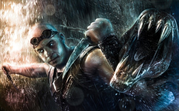 Riddick fighting a monster in the rain