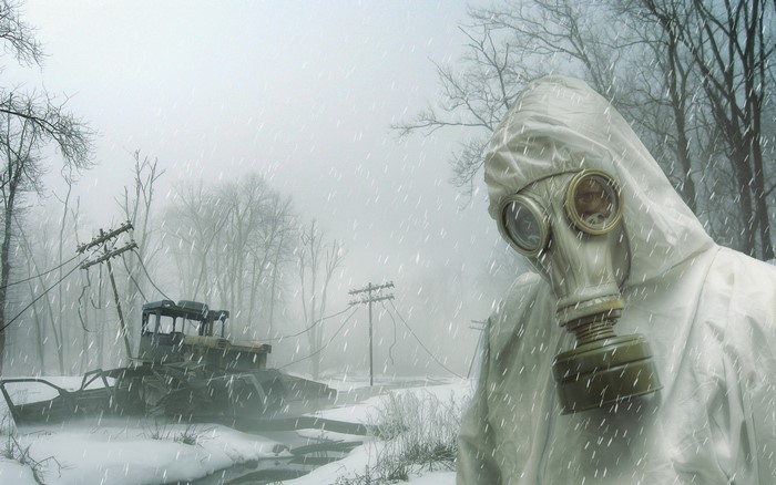 Stalker in gas mask in winter forest