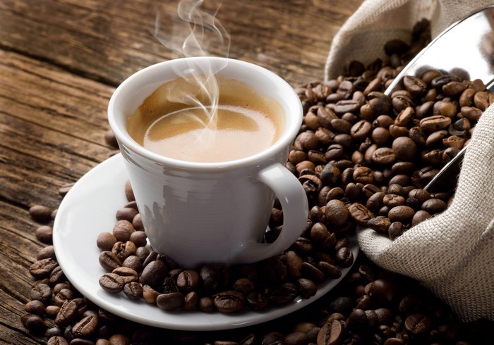 Cup of Coffee with Coffee Beans