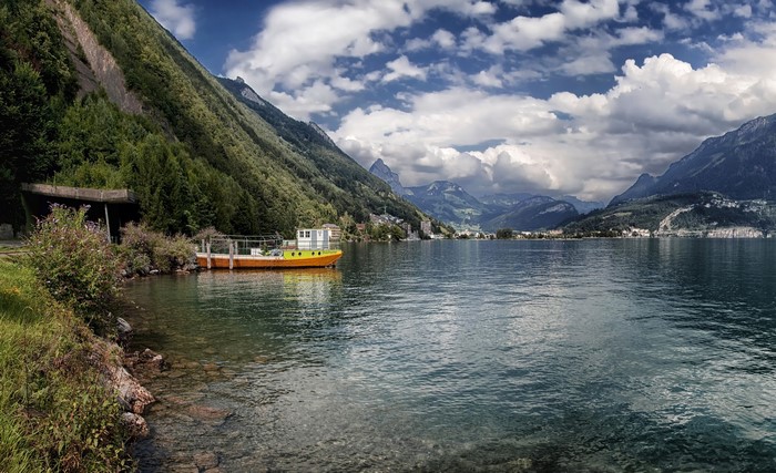Boat on Lake with Mountains in Schwyz, Switzerland