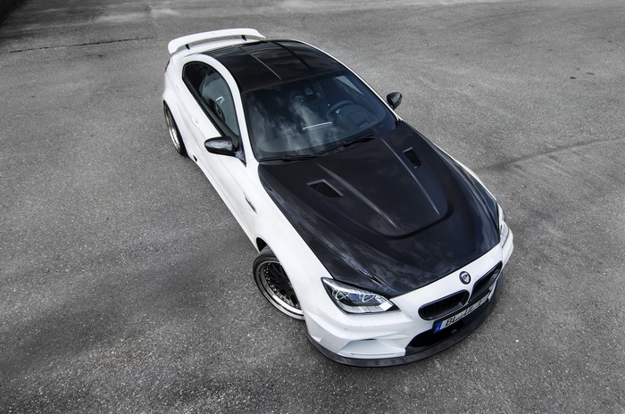 White BMW M6 F12 with black hood and roof