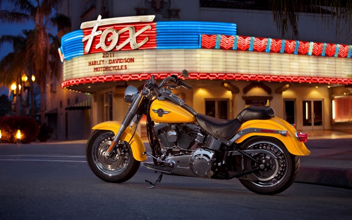 Yellow Harley-Davidson motorcycle in front of Fox theater