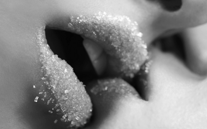 Close-up of lips covered in sugar