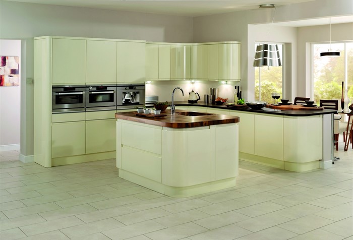 Modern cream kitchen with island and built-in appliances