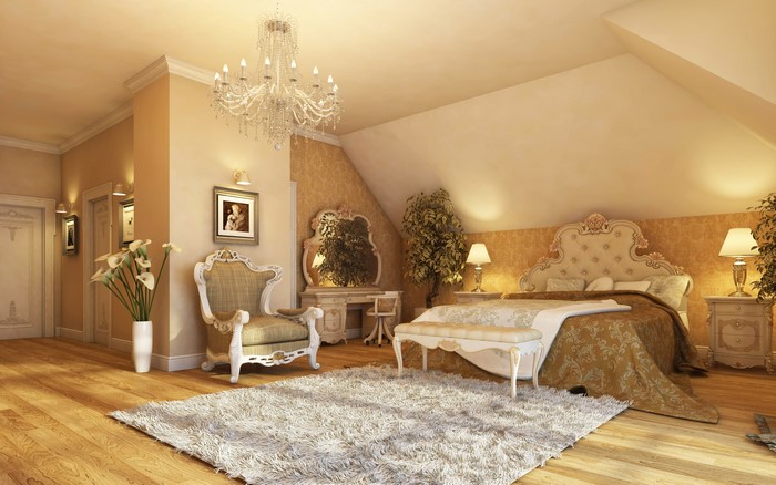 Luxury bedroom with chandelier and ornate furniture