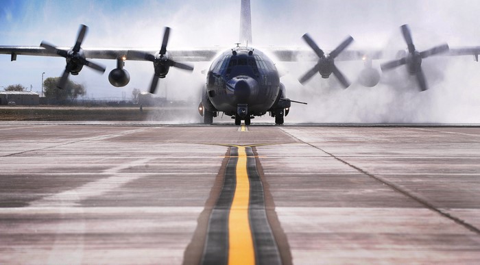 C-130W Stinger II aircraft on a wet tarmac