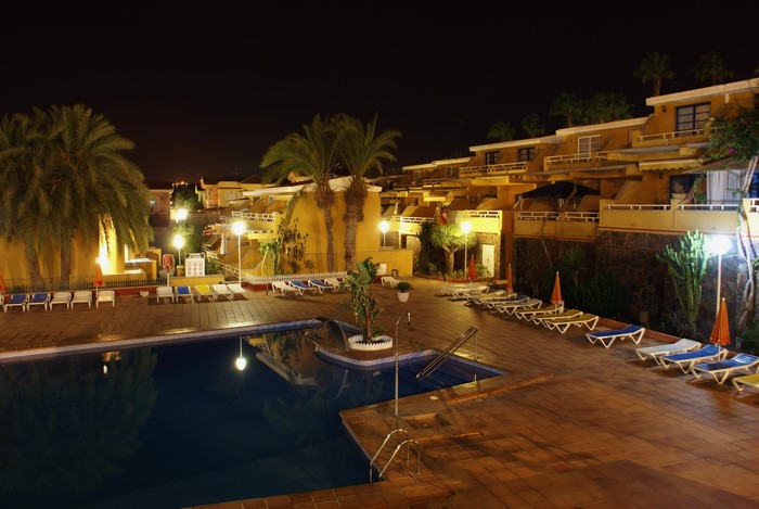 Resort pool area at night in the Canary Islands, Spain