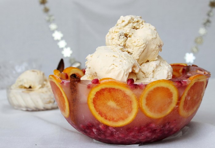 Ice cream in a fruit-decorated bowl
