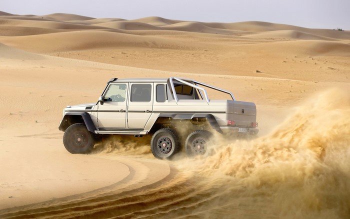 Mercedes-Benz G63 AMG 6x6 driving in desert dunes