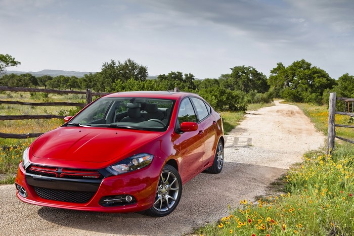 Red 2013 Dodge Dart Rallye on a dirt road