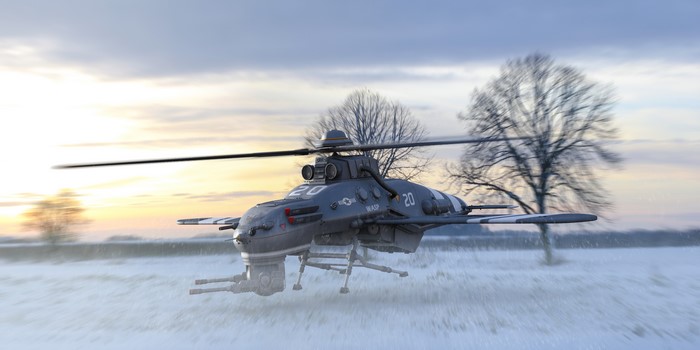 UAV helicopter in a snowy field at sunset