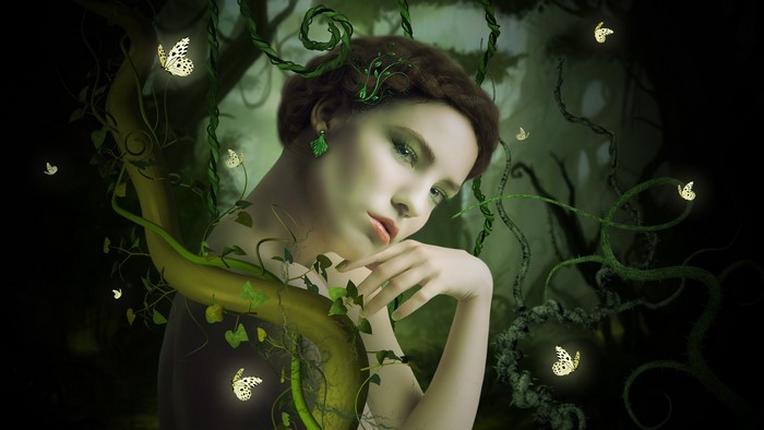 Woman surrounded by vines and butterflies