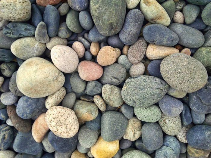 A close-up view of many colorful stones.