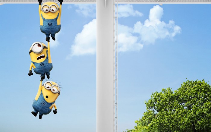 Minions from Despicable Me 2 hanging from a structure