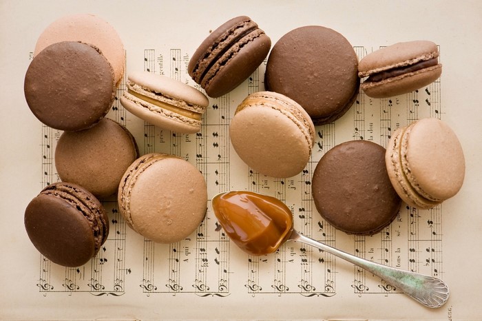Macarons and caramel on sheet music