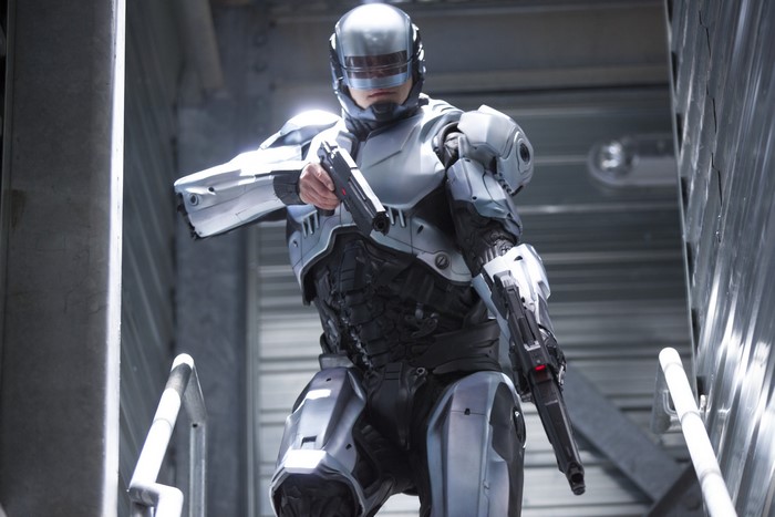 RoboCop holding two pistols