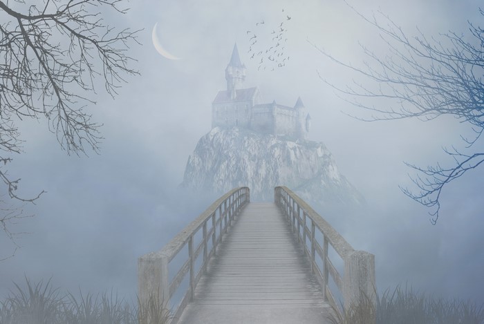 Gothic Fantasy Castle on a Cliff with Bridge in Fog