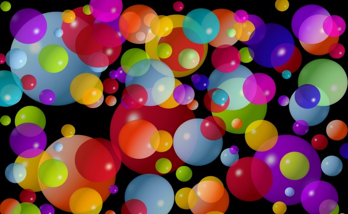 Many colorful balls on black background