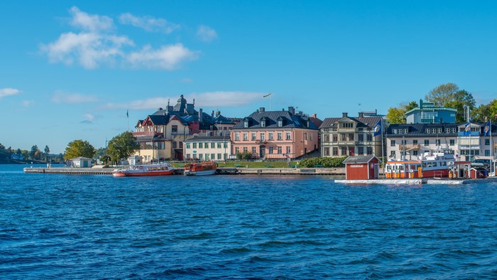 Vaxholm, Sweden waterfront with boats and buildings