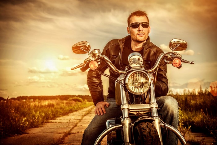 Man in Leather Jacket on Motorcycle