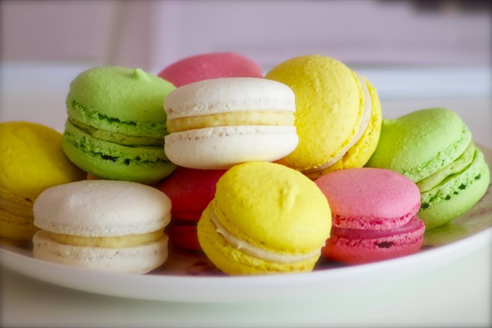 A plate of colorful macarons