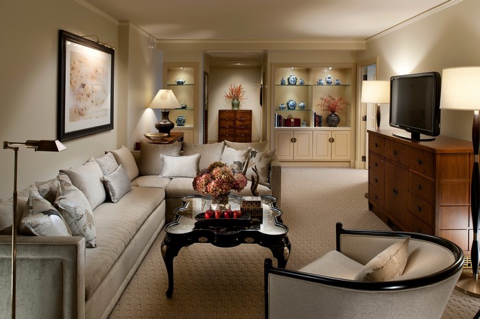 Living room with sectional sofa, coffee table, and TV