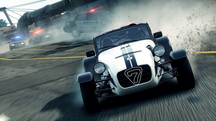 Caterham 7 pursued by police cars in Need for Speed Most Wanted